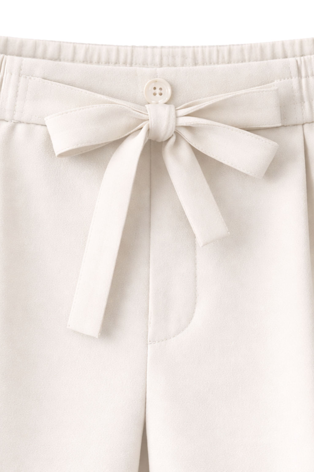 White pants with a bow detail on a white background